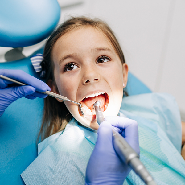 Young girl receiving a dental exam