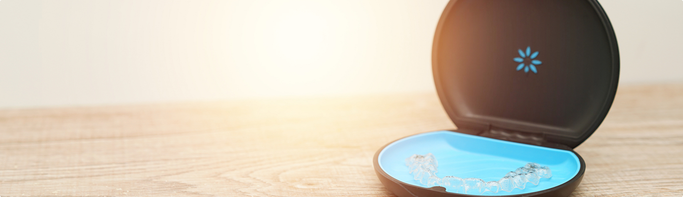 Invisalign clear aligners in their storage case