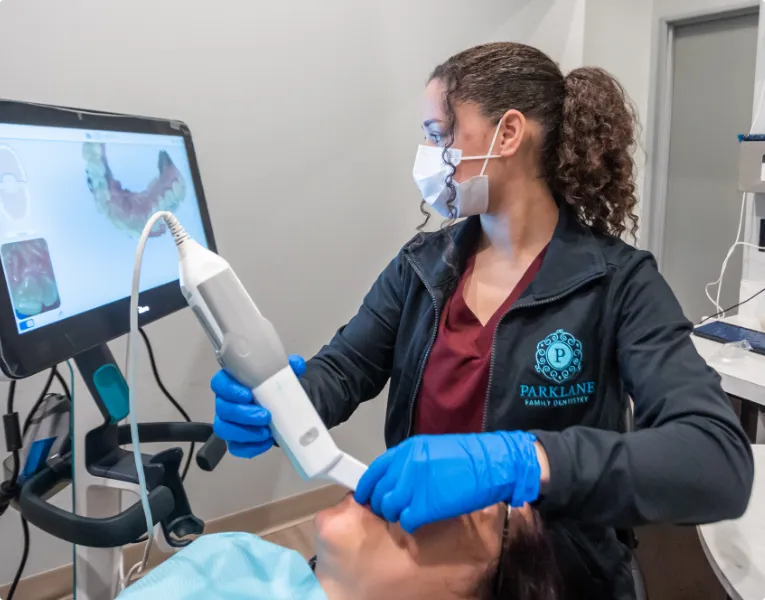 Little Elm dentist taking digital impressions of a patient's teeth