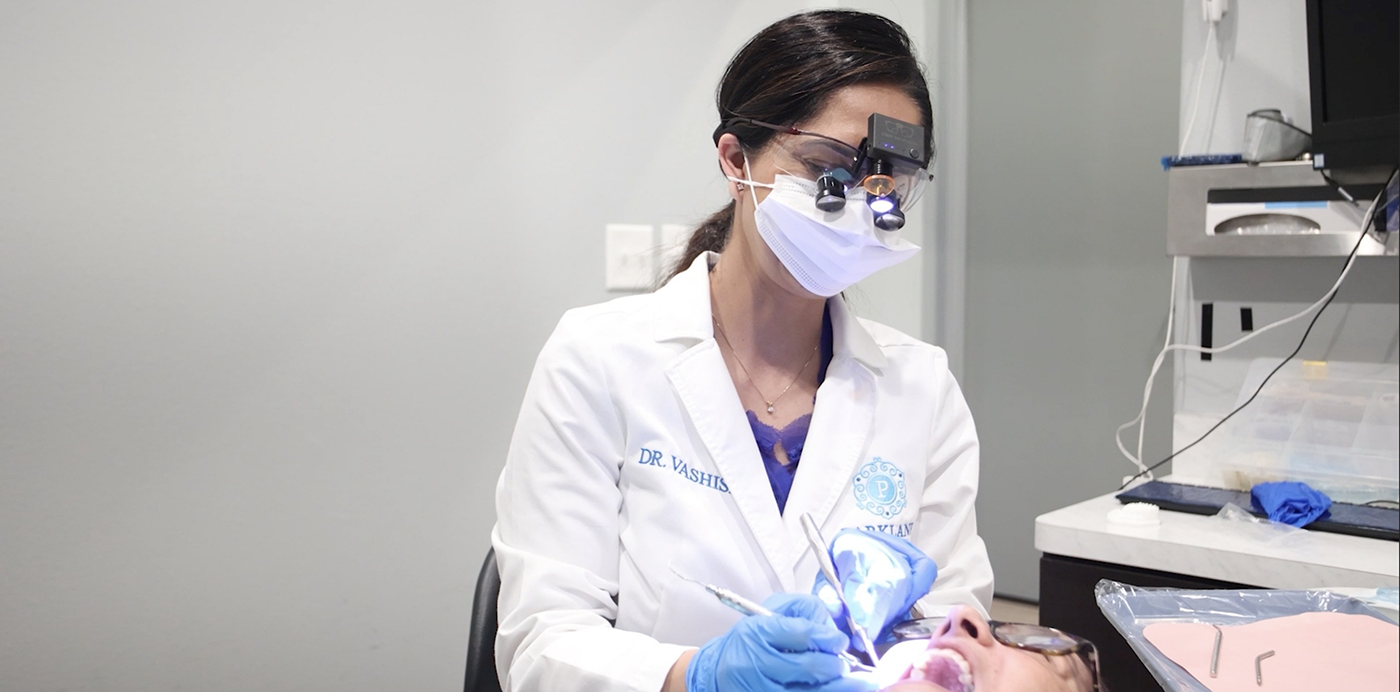 Little Elm dentist performing a dental treatment on a patient
