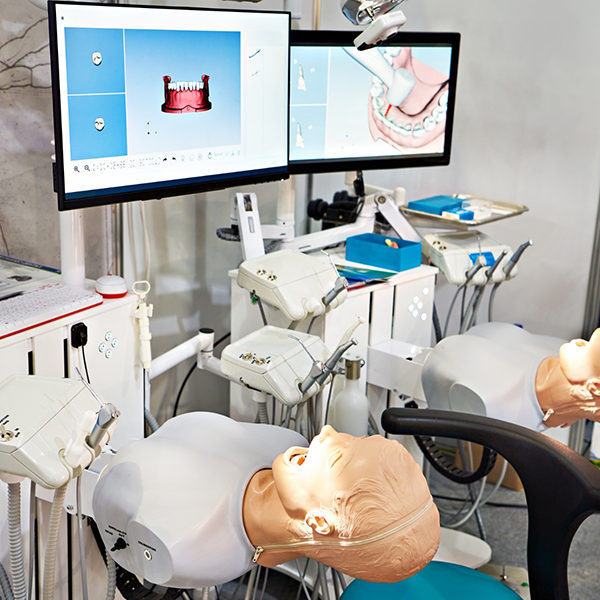 Practice treatment stations in a dental education facility