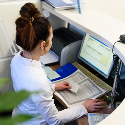 Receptionist at a desk