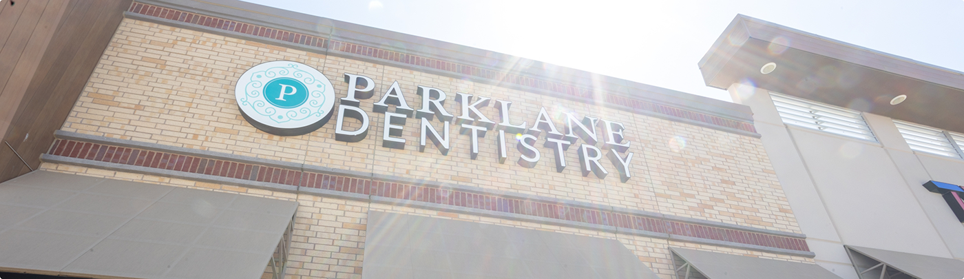 Parklane Family Dentistry sign on the front exterior of Little Elm dental office