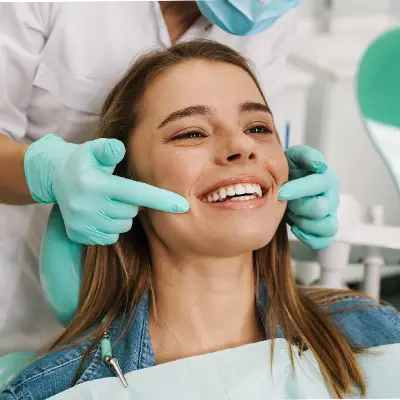 Woman smiling in the dental chair
